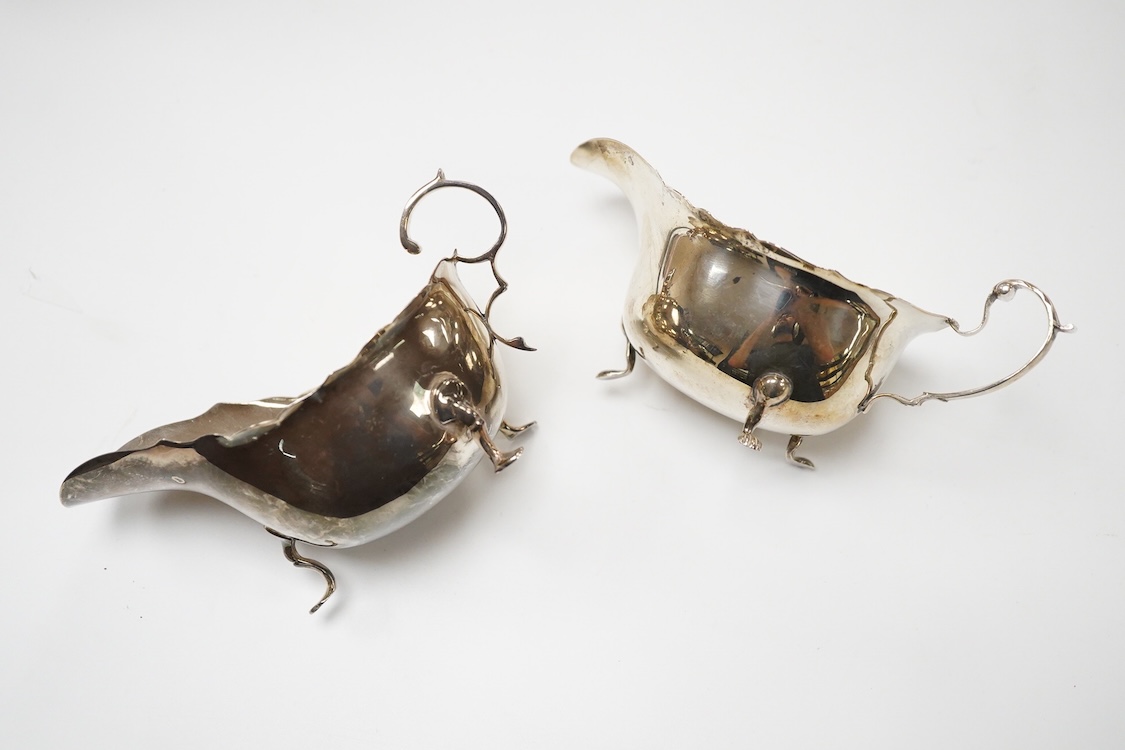 Two George V silver sauceboats, William Hutton & Sons, Birmingham, 1910 and S. Blanckensee & Sons, Birmingham, 1916, both approx. 16cm in length, 7.1oz.